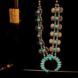 Turquoise squash blossom